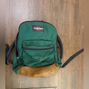 Vtg eastpak
 Forest Green and Tan Men's Backpack